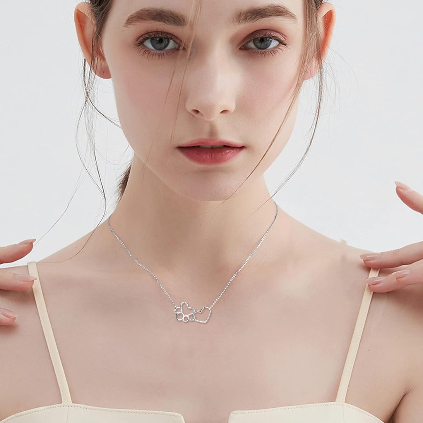 Sterling Silver Paw Print Necklace – Crystal Heart Pendant