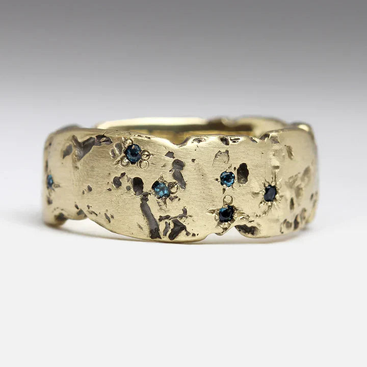 Vintage forged and gilded ring with blue crystal inlay