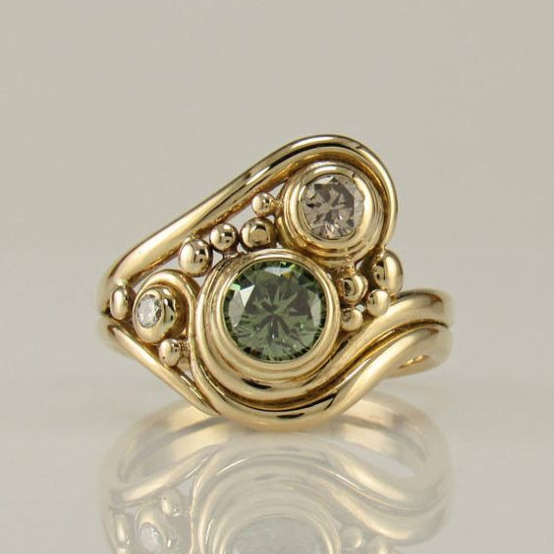 Vintage golden green zircon ring