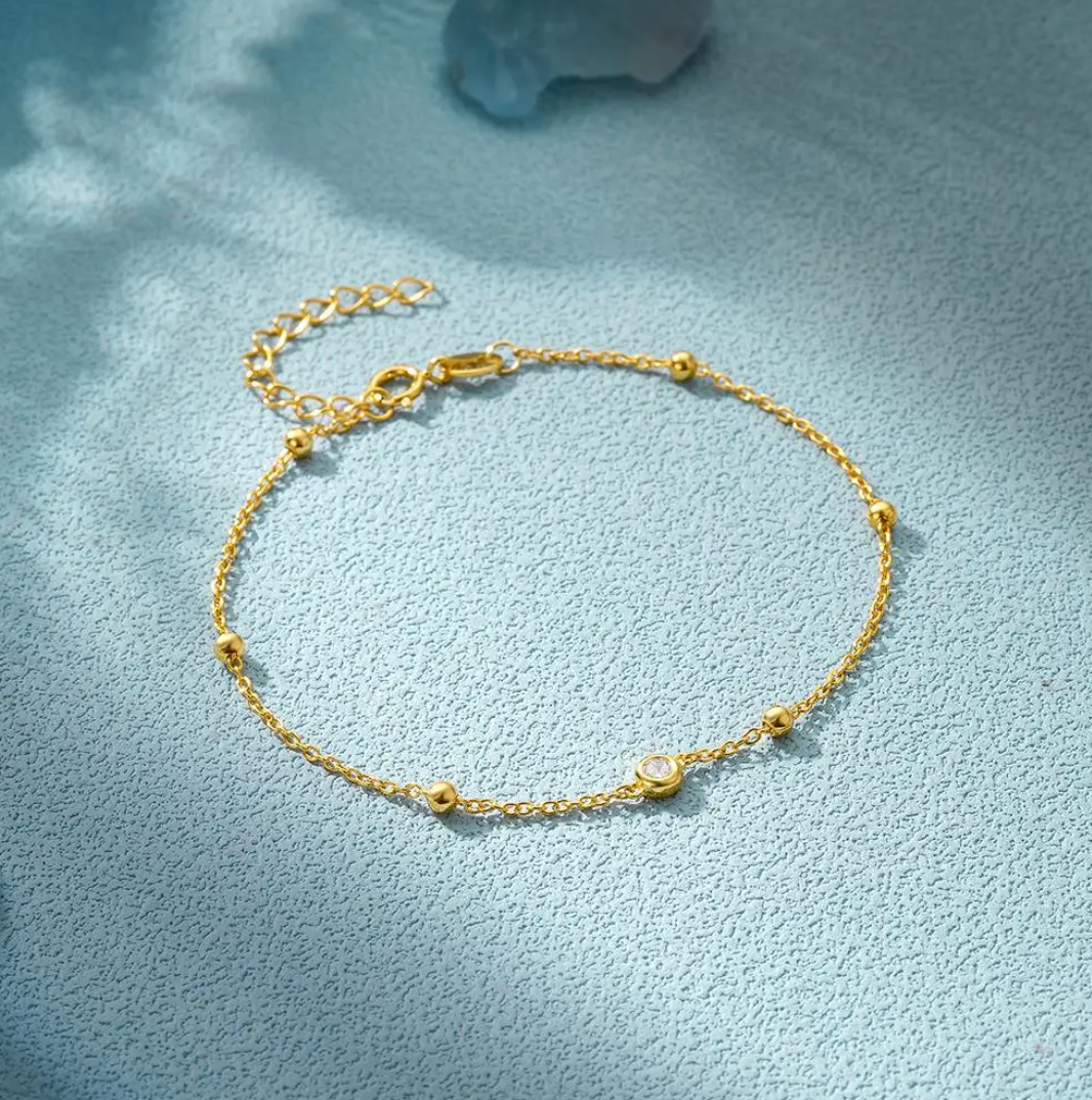 18-carat gold-plated evil eye and zirconia pearl bracelet