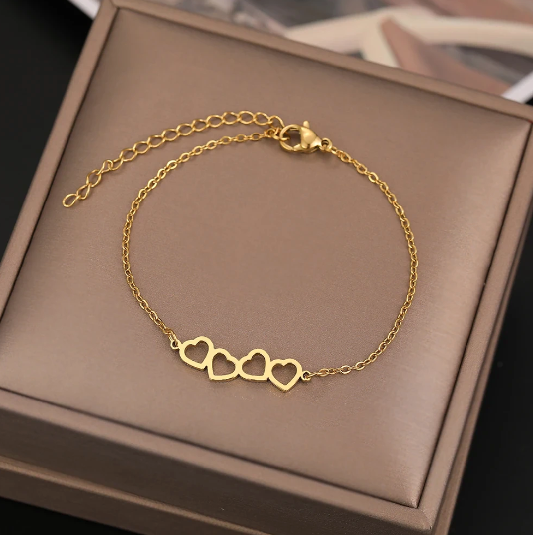 18-carat gold-plated bracelet with 4 hearts
