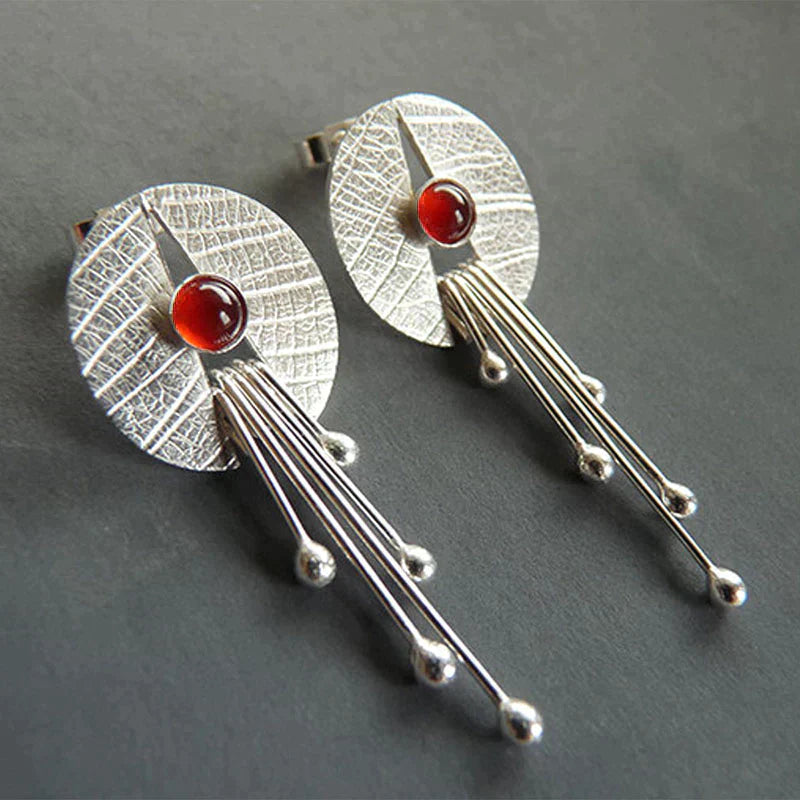 Hollow red stone drop earrings