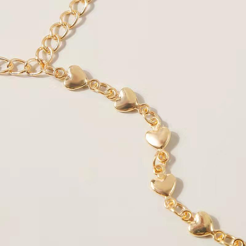 Living Hearts finger chain ring