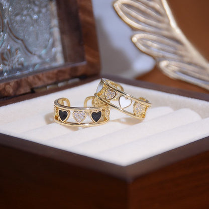 Zircon-inlaid open heart ring