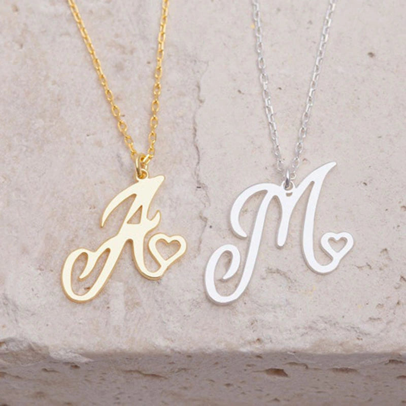 Initial pendant necklaces in cursive letter