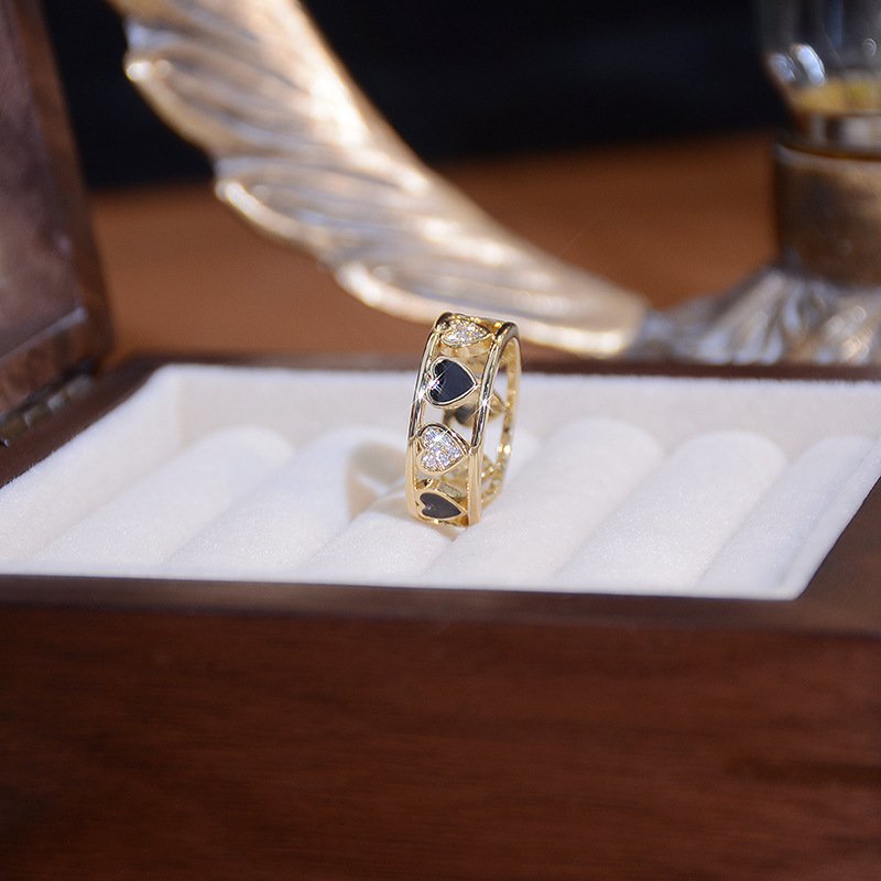 Zircon-inlaid open heart ring
