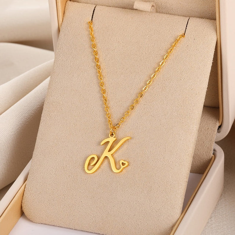 Initial pendant necklaces in cursive letter