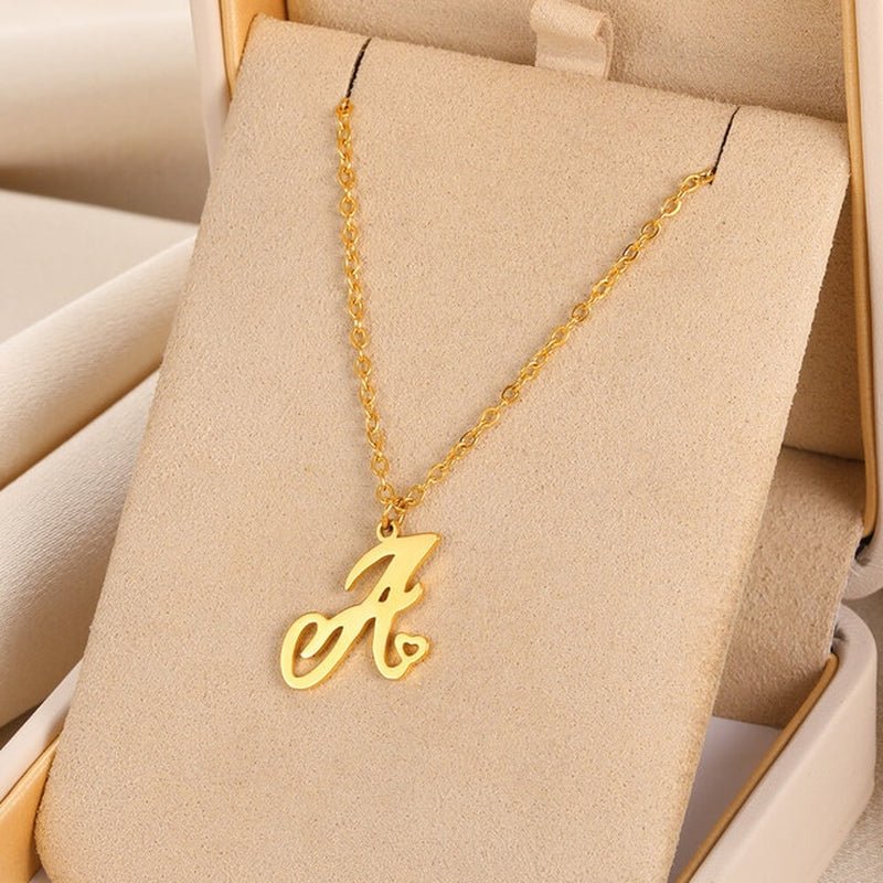 Initial pendant necklaces in cursive letter