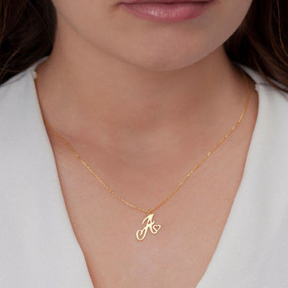 Initial pendant necklaces in cursive letter