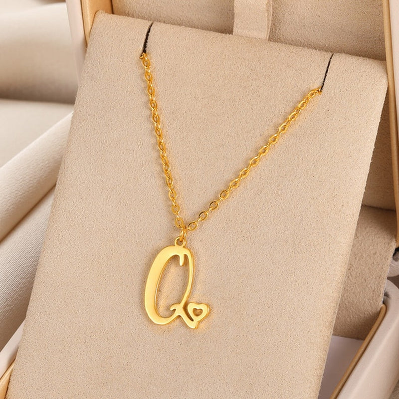 Initial pendant necklaces in cursive letter