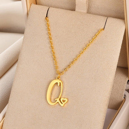Initial pendant necklaces in cursive letter