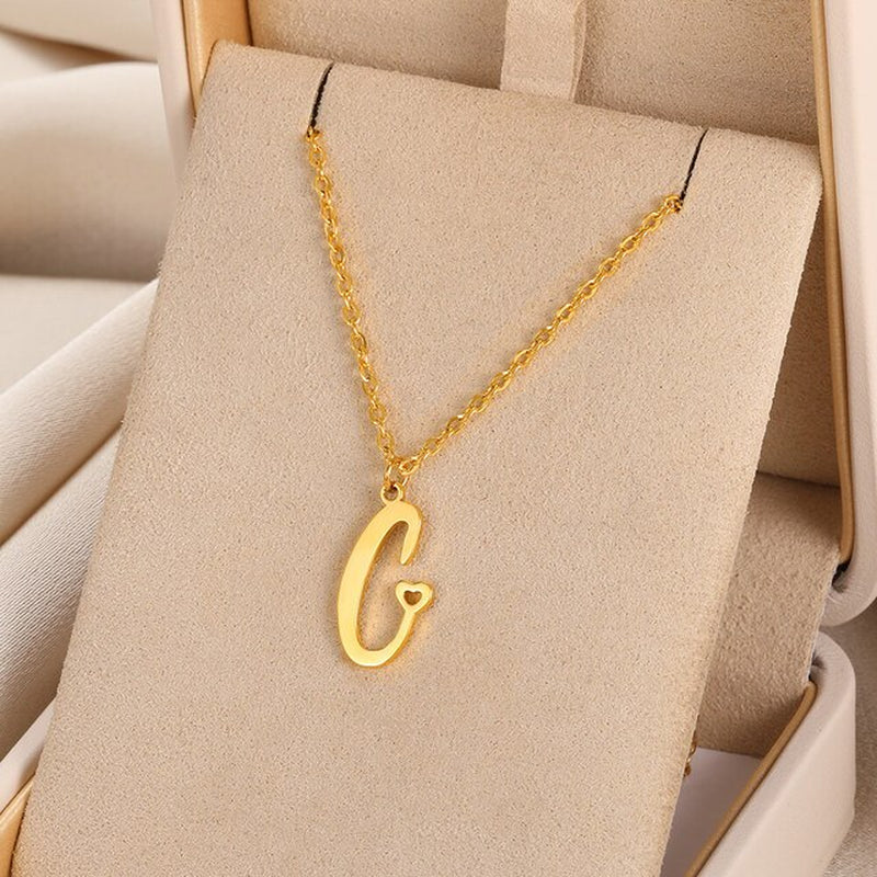 Initial pendant necklaces in cursive letter
