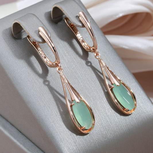 18-carat rose gold earrings with natural stone