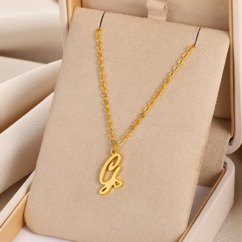 Initial pendant necklaces in cursive letter