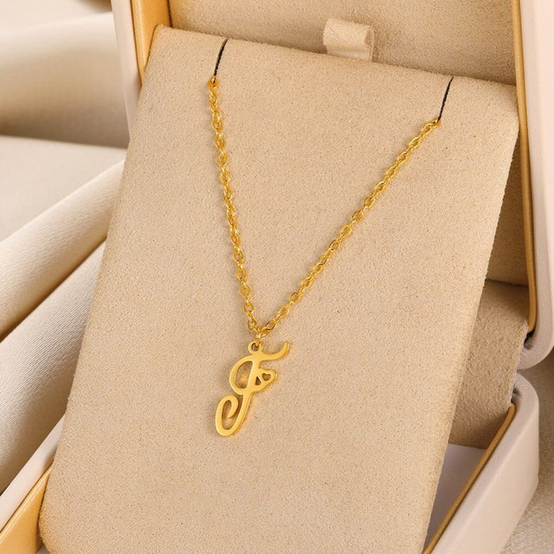 Initial pendant necklaces in cursive letter