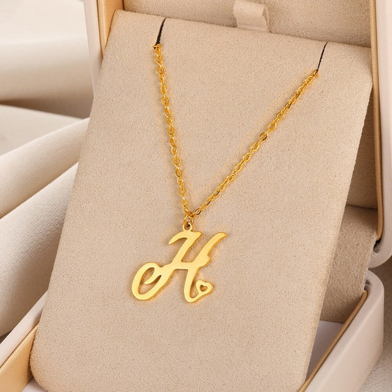 Initial pendant necklaces in cursive letter