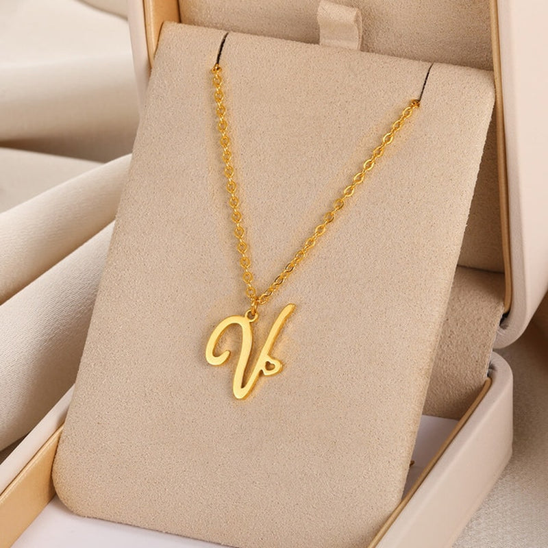 Initial pendant necklaces in cursive letter