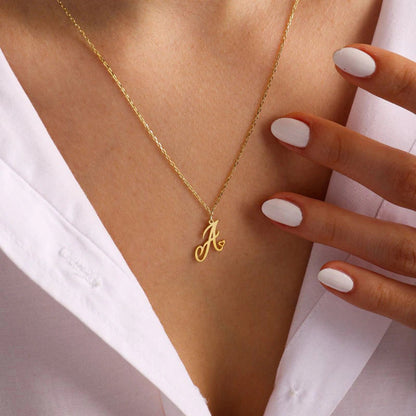 Initial pendant necklaces in cursive letter