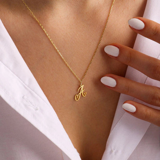 Initial pendant necklaces in cursive letter