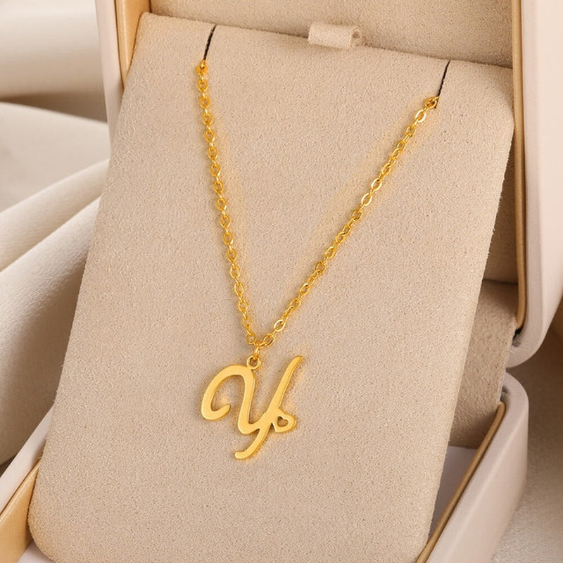 Initial pendant necklaces in cursive letter