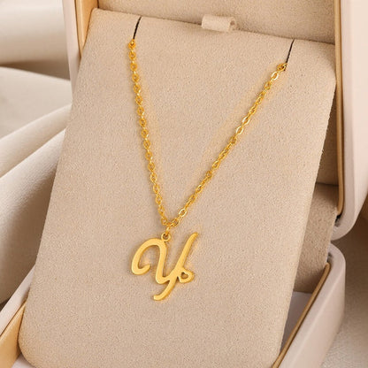 Initial pendant necklaces in cursive letter