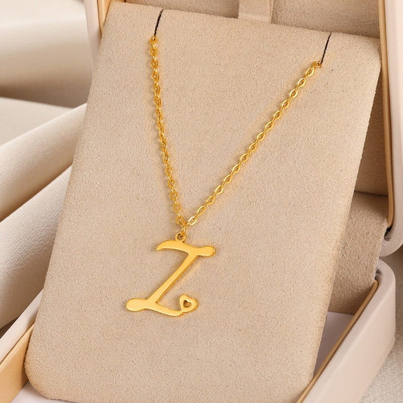 Initial pendant necklaces in cursive letter