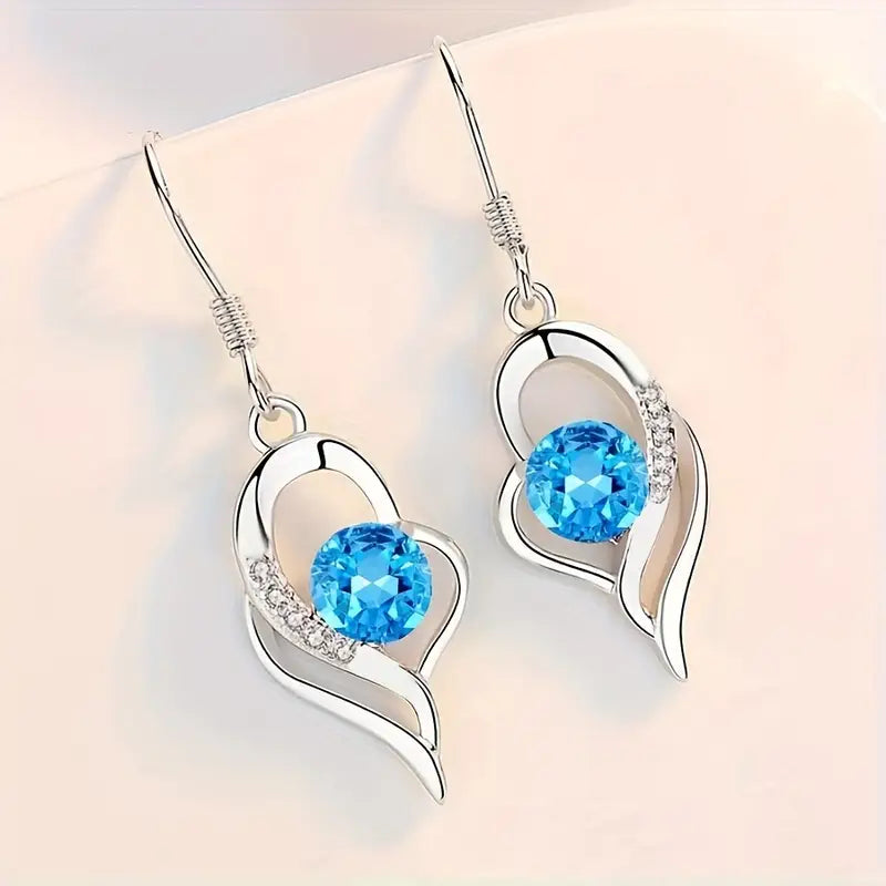 Eclipse heart drop earrings | White Gold