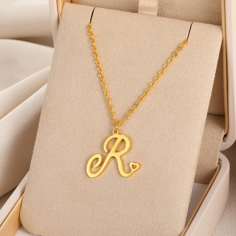 Initial pendant necklaces in cursive letter