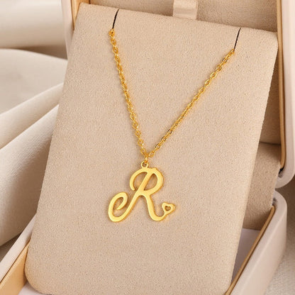 Initial pendant necklaces in cursive letter