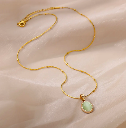 18-carat gold-plated blue crystal cross necklace