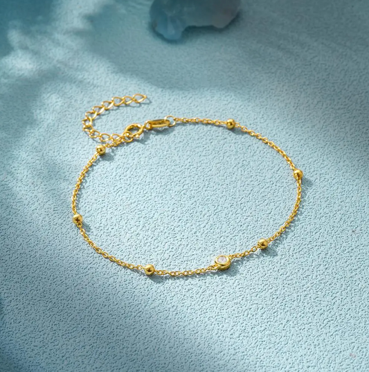 18-carat gold-plated evil eye and zirconia pearl bracelet