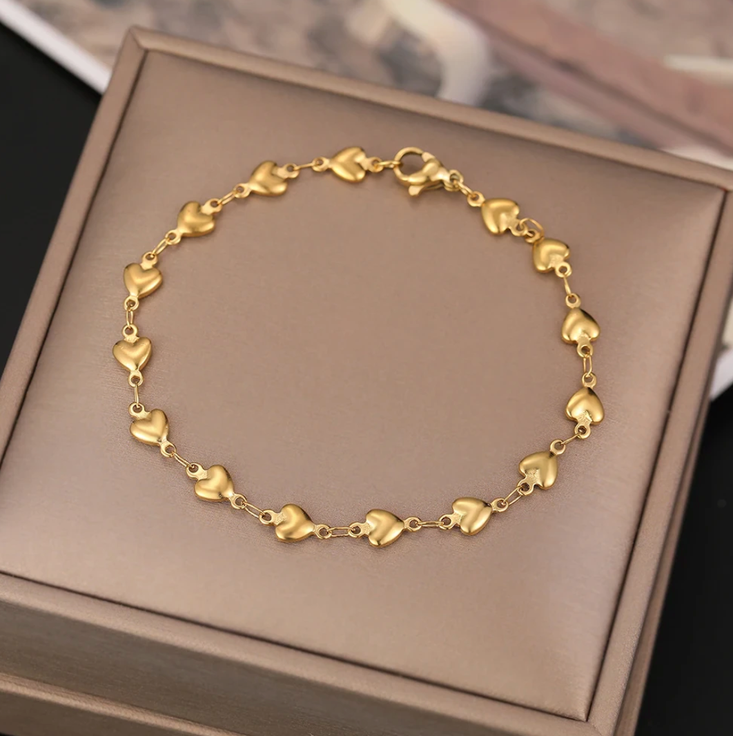 18-carat gold-plated bracelet with multiple small hearts