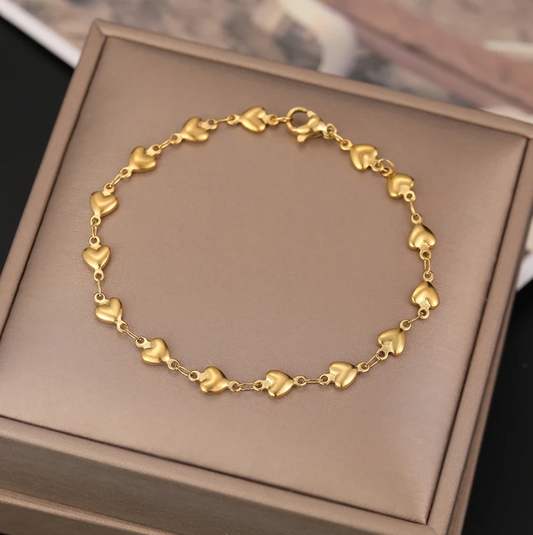 18-carat gold-plated bracelet with multiple small hearts
