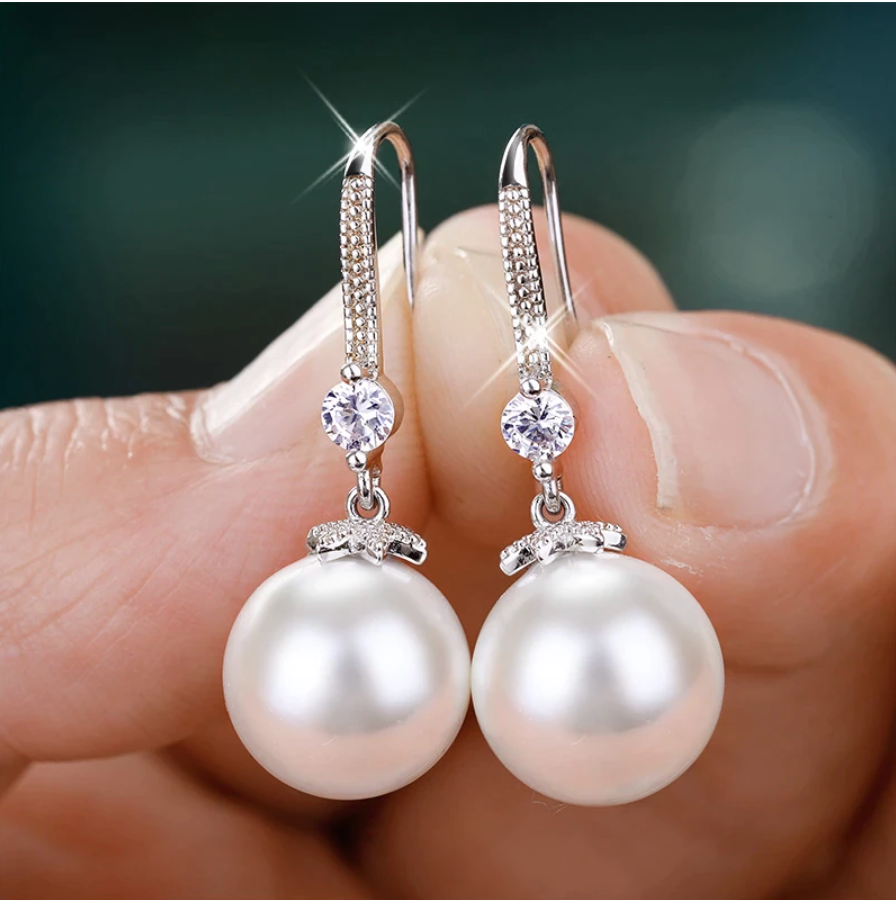 Handmade natural pearl earrings (round shape)