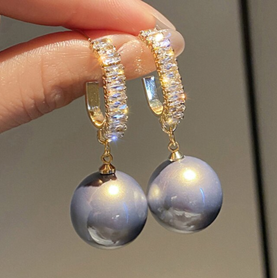 Natural pearl and blue enamel earrings