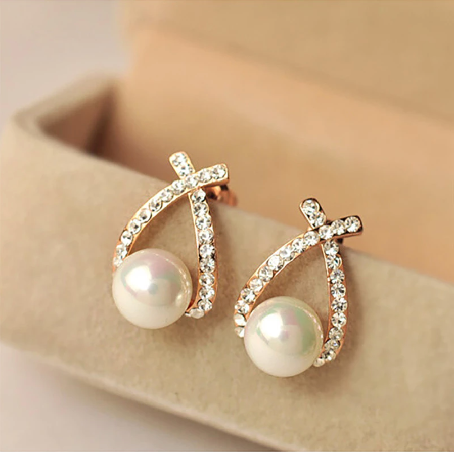 Cross pearl earrings with diamonds