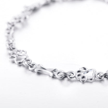 Limited Edition Pure Silver Dog Paw and Bone Charm Bracelet
