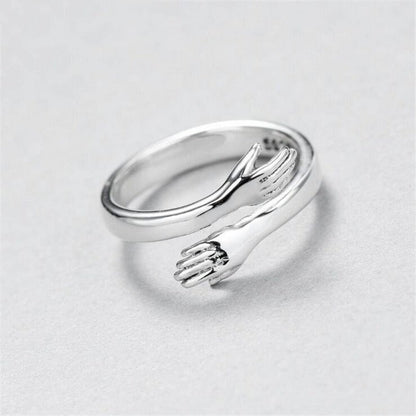 Adjustable silver hug ring