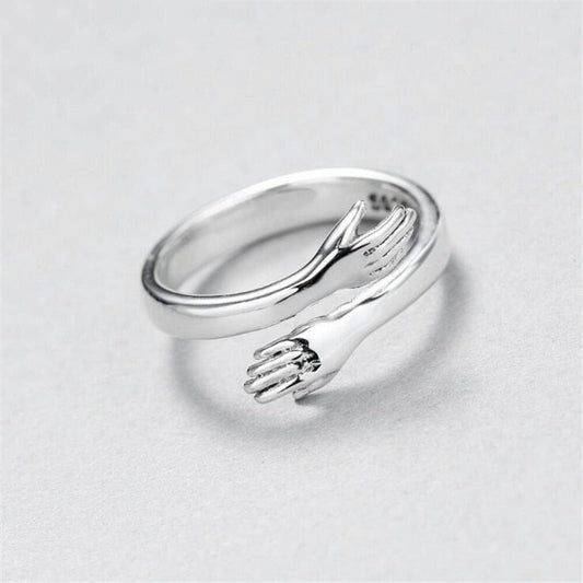 Adjustable silver hug ring