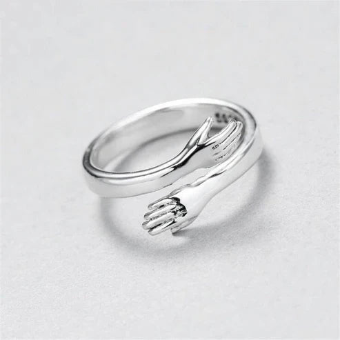 Adjustable silver hug ring