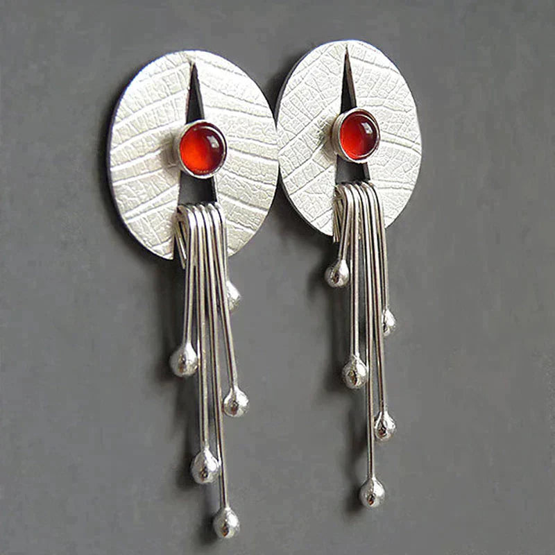 Hollow red stone drop earrings