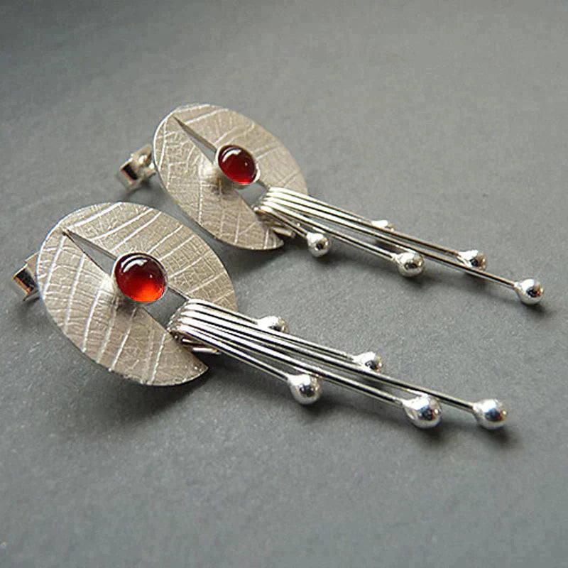 Hollow red stone drop earrings