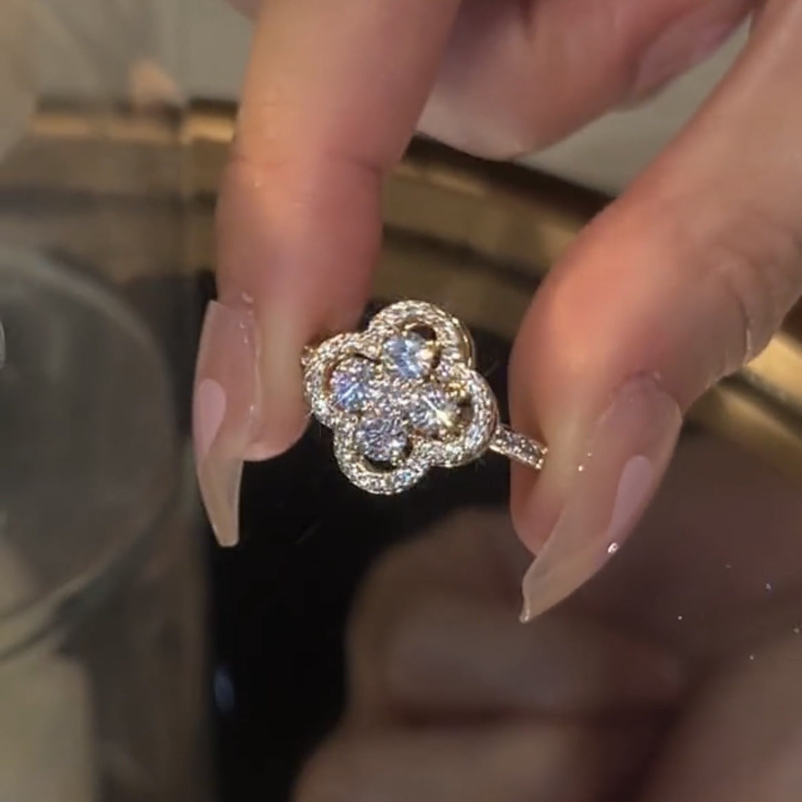 Clover spinner ring with zircons