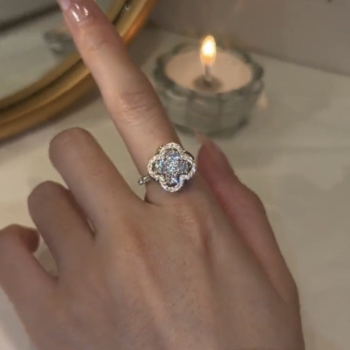 Clover spinner ring with zircons