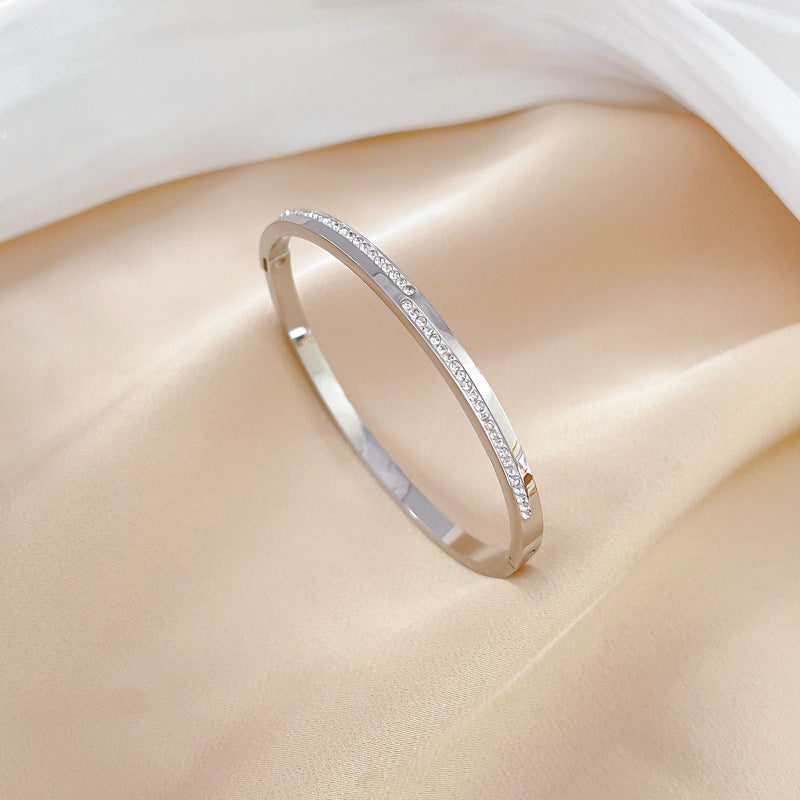 Aera golden rigid crystal bracelet