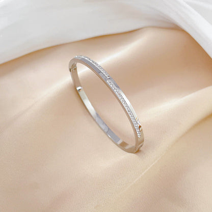 Aera golden rigid crystal bracelet