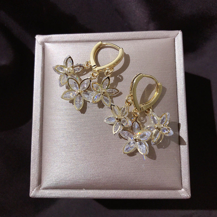 Creative Spring Star drop earrings