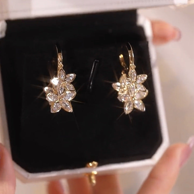 Creative Spring Star drop earrings