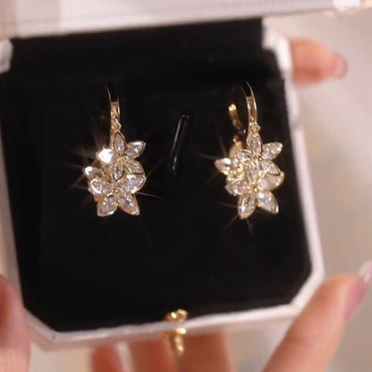 Creative Spring Star drop earrings