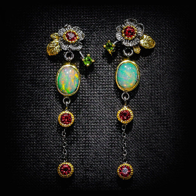 18-carat gold-plated hoop earrings with turquoise North Star pendants